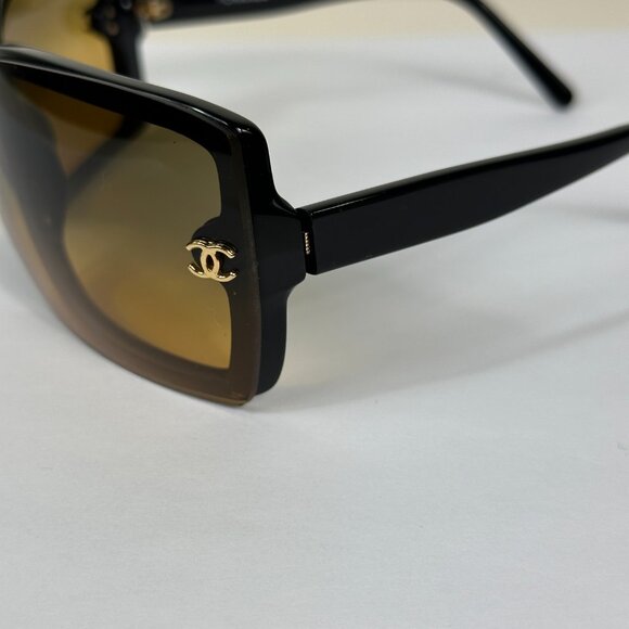 Authentic Chanel logo sunglasses with box& case